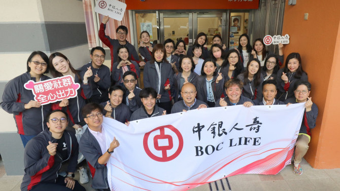 Corporate Volunteer Team Giving Back to Society